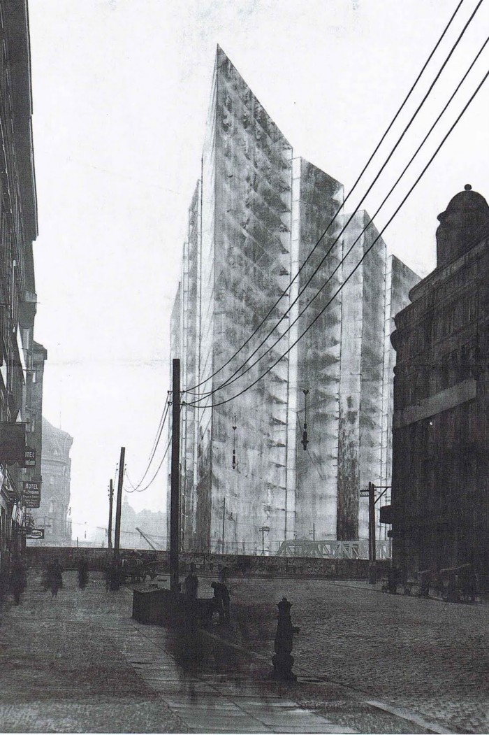 Ludwig Mies van der Rohe kavand Friedrichstrasse pilvelõhkujale Berliinis (1921). Ühest küljest ei olnud selline läbipaistvuse käsitlus disainiprotsessis midagi uut – X-kiirtele omast kujutusviisi kohtab arhitektuuriajaloos ka röntgenieelsetel perioodidel. Asjaolu, et üldsus oli selle esteetika omaks võtnud, kannustas arhitekte aga esmakordselt seda viimistletud lõpplahendustes rakendama. Tähelepanuväärne on, et Mies kasutas oma arhitektuursete ideede selgitamiseks artiklites ka ise röntgenikujutisi.